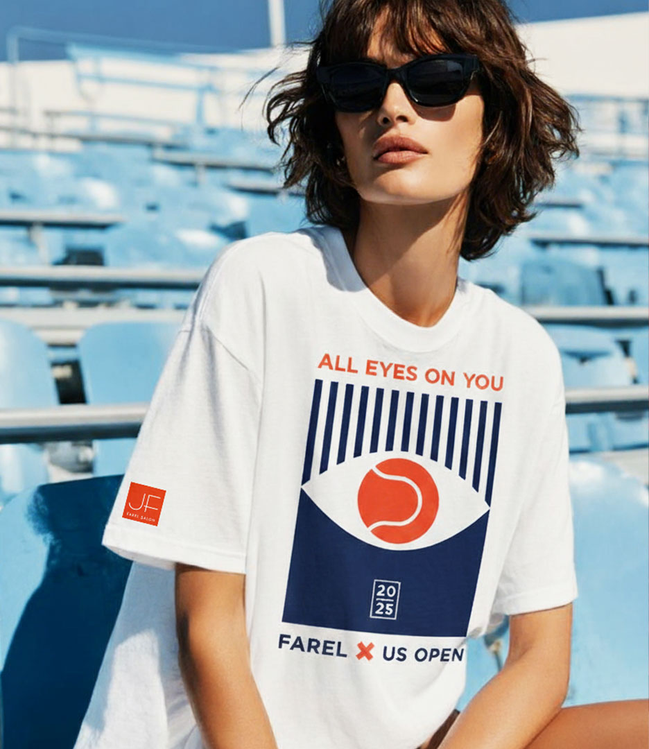 Model wearing PlanetFab Studio's Julien Farel US Open 2025 branding campaign limited-edition T-shirt with 'All Eyes on You' graphic