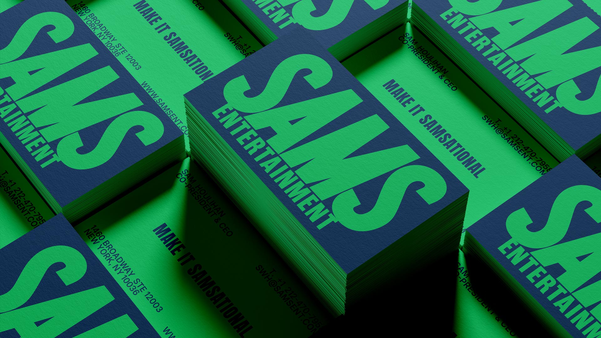Stack of Sams Entertainment business cards with Make It Samsational tagline