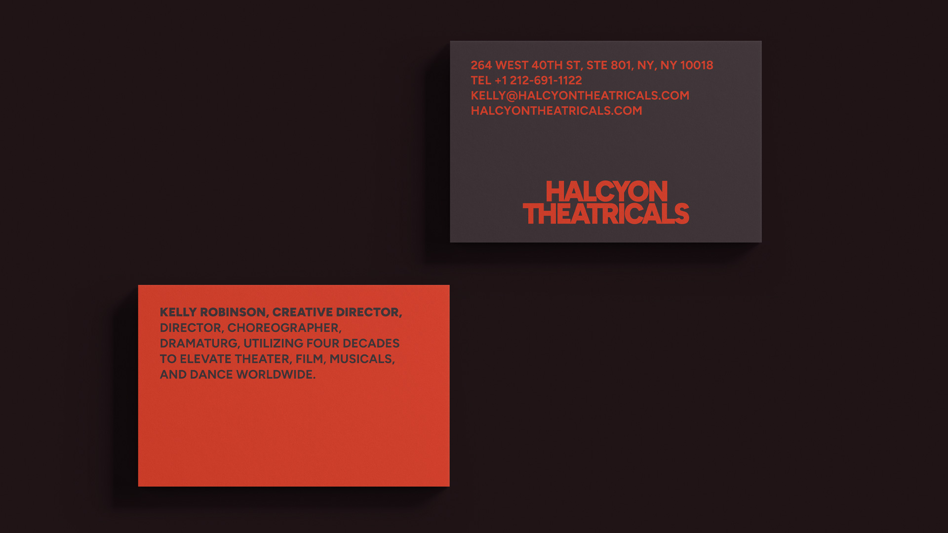 Front and back of a Halcyon Theatricals business card featuring the red and dark brown brand palette, company wordmark and Kelly Robinson’s contact information.